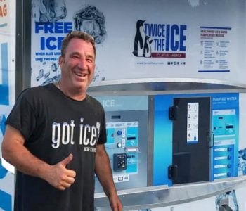Marc Savenor standing next to his Twice The Ice machine